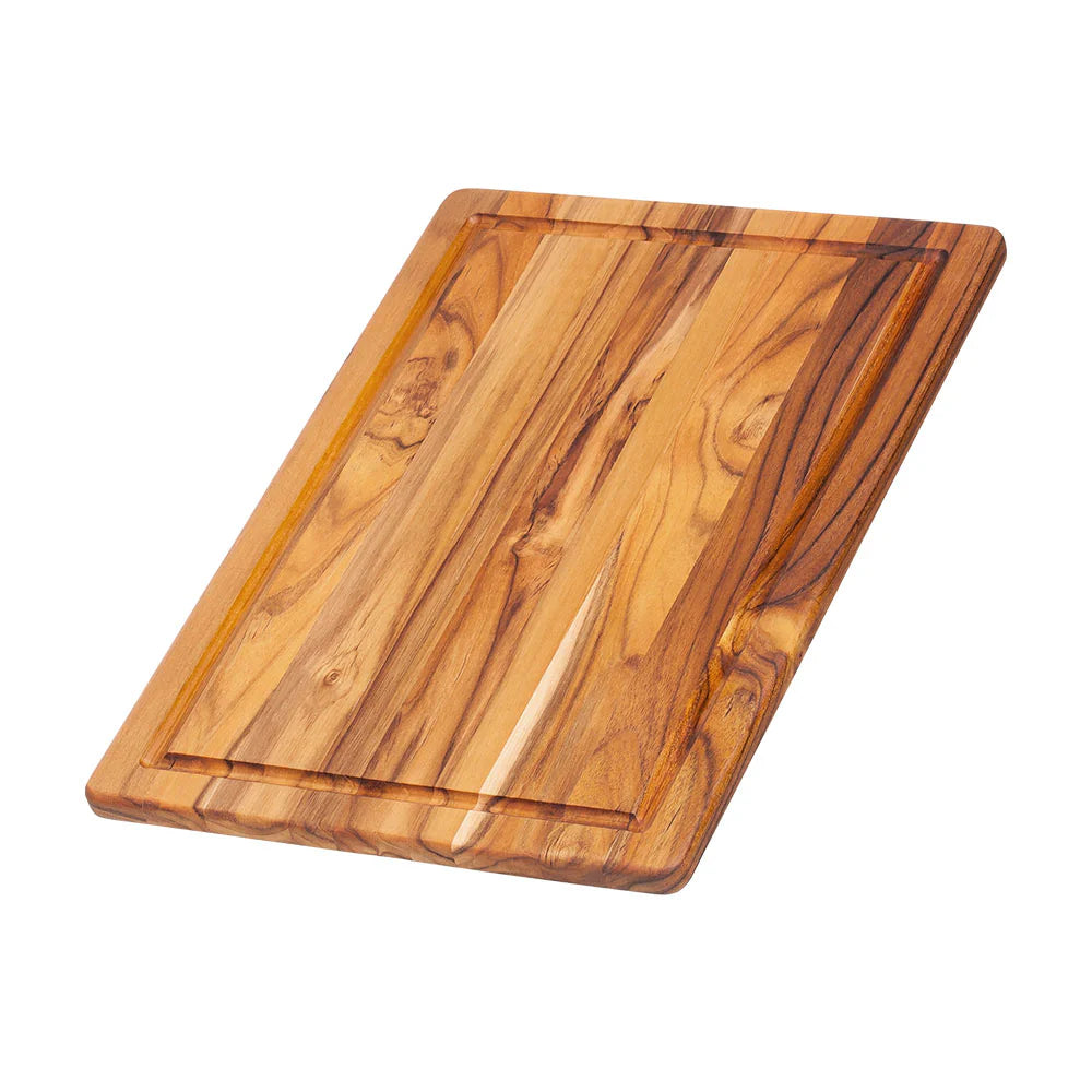 Essential cutting/serving board juice canal